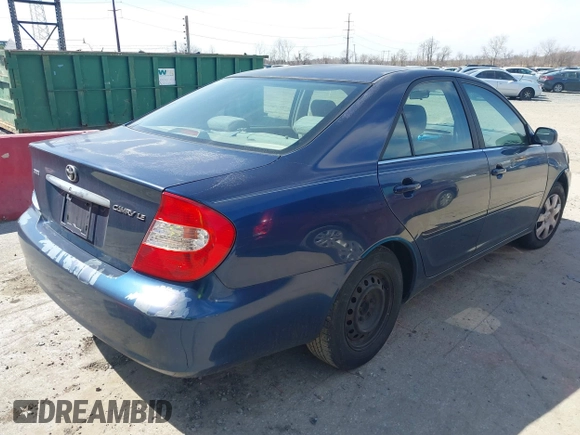 2002 Toyota Camry LE z VIN JTDBE32KX20111362, wystawiony jako IAAI lot #41820475 z przebiegiem 270 091 mil mil oraz . Historia ofert i sprzedaży dostępna na DreamBid. Obrazek 4.