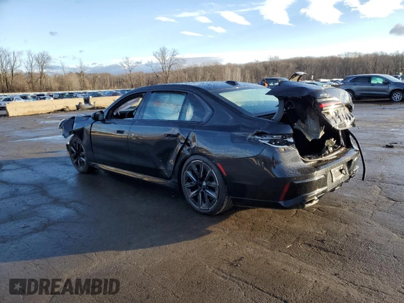 2023 BMW 7 Series 760i xDrive with VIN WBA33EJ0XPCM80117, listed as a Copart auction lot 84407104 with Not provided miles and Salvage title. Bid and sale history available at DreamBid. Image 2.