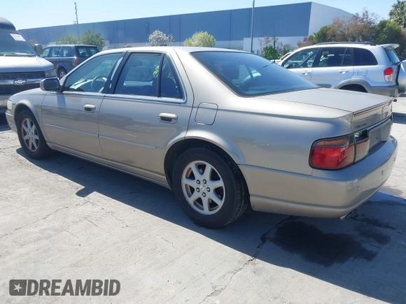 2002 Cadillac Seville Luxury SLS z VIN 1G6KS54Y92U207873, wystawiony jako IAAI lot #41957595 z przebiegiem 118 580 mil mil oraz . Historia ofert i sprzedaży dostępna na DreamBid. Obrazek 3.