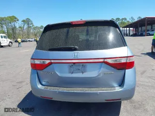 2013 Honda Odyssey Touring with VIN 5FNRL5H94DB069716, listed as a IAAI auction lot 41901369 with 243,492 mi miles. Bid and sale history available at carsss.com. Image 17.
