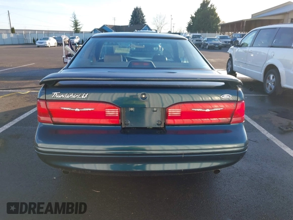 1996 Ford Thunderbird LX z VIN 1FALP62W1TH100925, wystawiony jako IAAI lot #41289811 z przebiegiem 84 056 mil mil oraz . Historia ofert i sprzedaży dostępna na DreamBid. Obrazek 16.