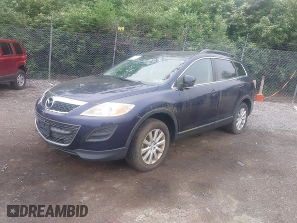 2010 Mazda CX-9 Sport with VIN JM3TB3MVXA0217305, listed as a IAAI auction lot 42188795 with 131,875 mi miles and . Bid and sale history available at DreamBid. Image 2.
