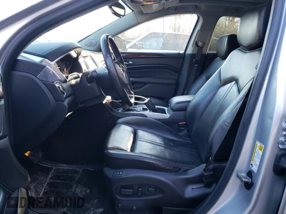 2014 Cadillac SRX Luxury Collection z VIN 3GYFNEE34ES641335, wystawiony jako Copart lot #47519325 z przebiegiem 124 407 mil mil oraz Szkoda całkowita • Salvage title. Historia ofert i sprzedaży dostępna na DreamBid. Obrazek 7.