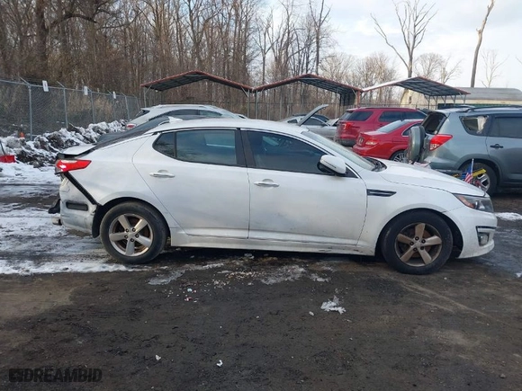 2015 Kia Optima LX with VIN 5XXGM4A74FG499110, listed as a IAAI auction lot 41303712 with 98,287 mi miles. Bid and sale history available at carsss.com. Image 13.