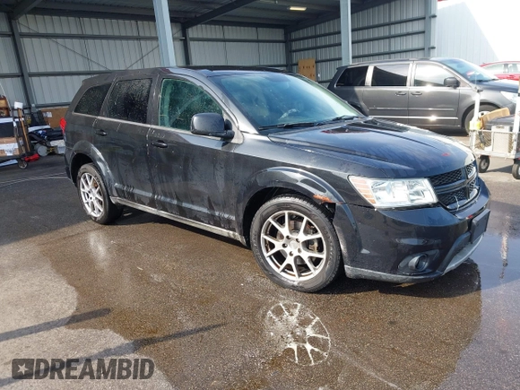 2013 Dodge Journey R/T with VIN 3C4PDCEG7DT682670, listed as a IAAI auction lot 42057985 with 221,755 mi miles and . Bid and sale history available at DreamBid. Image 1.
