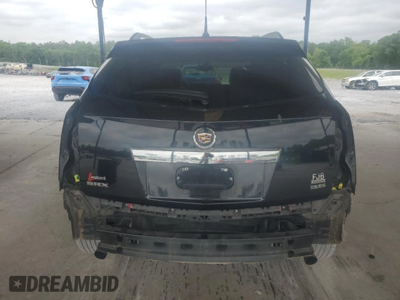 2014 Cadillac SRX z VIN 3GYFNAE39ES558430, wystawiony jako Copart lot #54555645 z przebiegiem 119 524 mil mil oraz Szkoda całkowita • Salvage title. Historia ofert i sprzedaży dostępna na DreamBid. Obrazek 6.