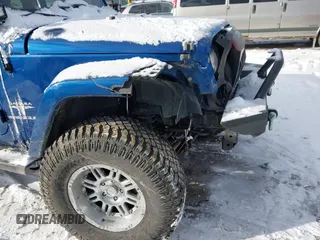 2010 Jeep Wrangler Sahara z VIN 1J4AA5D18AL170957, wystawiony jako IAAI lot #41599820 z przebiegiem 64 217 mil mil oraz . Historia ofert i sprzedaży dostępna na DreamBid. Obrazek 6.