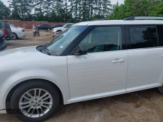 2014 Ford Flex SEL z VIN 2FMGK5C8XEBD00203, wystawiony jako IAAI lot #42304671 z przebiegiem 109 639 mil mil oraz . Historia ofert i sprzedaży dostępna na DreamBid. Obrazek 6.