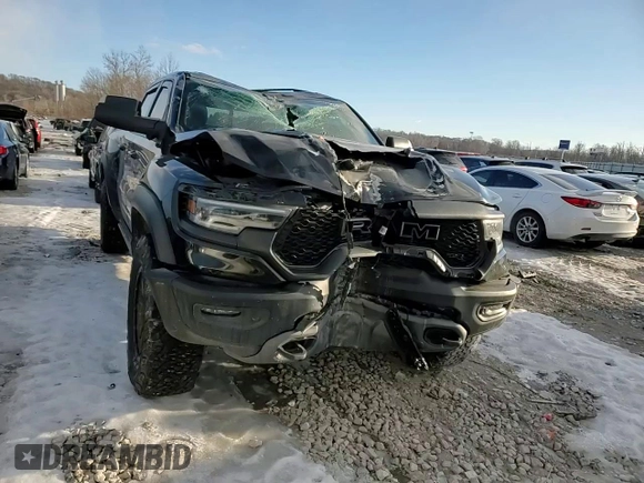 2021 Ram 1500 TRX with VIN 1C6SRFU9XMN704748, listed as a Copart auction lot 89356555 with 104,286 mi miles and Salvage Title. Bid and sale history available at carsss.com. Image 13.