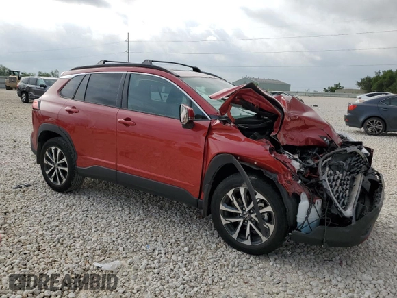2022 Toyota Corolla Cross XLE with VIN 7MUDAAAG7NV019610, listed as a Copart auction lot 55146165 with 13,633 mi miles and Salvage title. Bid and sale history available at DreamBid. Image 4.