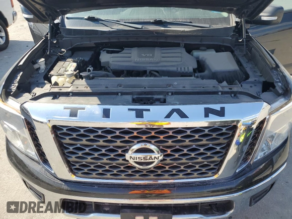 2017 Nissan Titan S with VIN 1N6AA1EJ4HN571219, listed as a Copart auction lot 43154215 with 63,876 mi miles and Salvage Title. Bid and sale history available at carsss.com. Image 12.