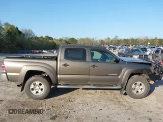 2014 Toyota Tacoma with VIN 3TMLU4EN3EM163162, listed as a IAAI auction lot 41930392 with 167,368 mi miles and . Bid and sale history available at DreamBid. Image 14.