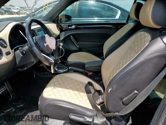 2019 Volkswagen Beetle S with VIN 3VW5DAAT1KM510718, listed as a Copart auction lot 58332605 with Not provided miles and Salvage title. Bid and sale history available at DreamBid. Image 7.