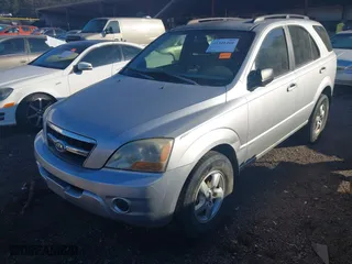 2009 Kia Sorento LX with VIN KNDJD735X95872078, listed as a IAAI auction lot 41201260 with 202,674 mi miles. Bid and sale history available at carsss.com. Image 2.