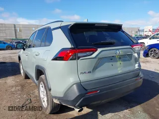 2021 Toyota RAV4 XLE with VIN 2T3W1RFV6MW163395, listed as a IAAI auction lot 42455461 with 65,840 mi miles and . Bid and sale history available at DreamBid. Image 3.