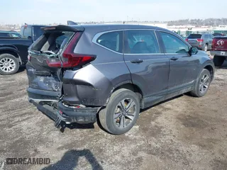 2020 Honda CR-V LX with VIN 2HKRW2H20LH607675, listed as a IAAI auction lot 41645896 with 64,973 mi miles. Bid and sale history available at carsss.com. Image 4.