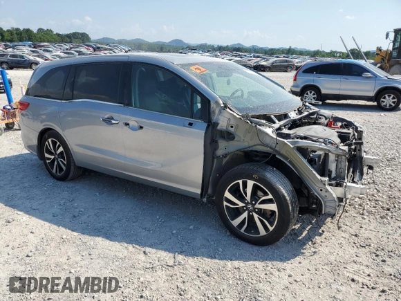 2018 Honda Odyssey Elite with VIN 5FNRL6H94JB010442, listed as a Copart auction lot 62077815 with 118,058 mi miles and Salvage title. Bid and sale history available at DreamBid. Image 4.