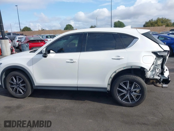 2018 Mazda CX-5 Grand Touring with VIN JM3KFADMXJ0470846, listed as a IAAI auction lot 41913533 with 54,700 mi miles and . Bid and sale history available at DreamBid. Image 15.