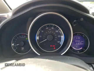 2016 Honda Fit LX z VIN JHMGK5H57GX020610, wystawiony jako Copart lot #61012305 z przebiegiem 99 001 mil mil oraz Szkoda całkowita • Salvage title. Historia ofert i sprzedaży dostępna na DreamBid. Obrazek 9.