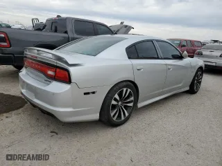 2012 Dodge Charger SRT8 with VIN 2C3CDXEJ6CH114987, listed as a Copart auction lot 87500795 with 165,176 mi miles and Salvage Title. Bid and sale history available at carsss.com. Image 3.