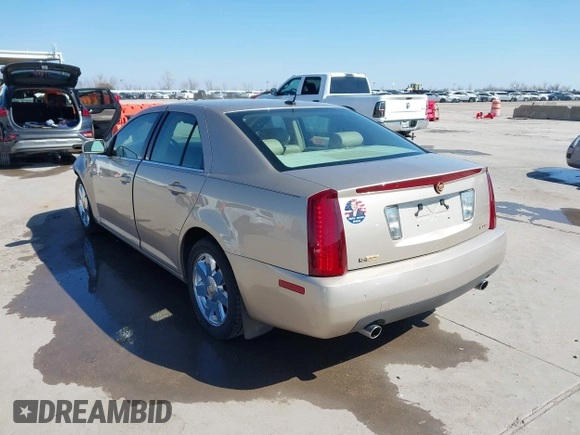2005 Cadillac STS z VIN 1G6DC67A950171835, wystawiony jako IAAI lot #41599105 z przebiegiem 74 235 mil mil oraz . Historia ofert i sprzedaży dostępna na DreamBid. Obrazek 3.
