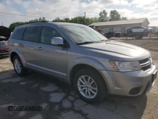 2017 Dodge Journey SXT with VIN 3C4PDCBG5HT526573, listed as a Copart auction lot 56756255 with 194,076 mi miles and Salvage title. Bid and sale history available at DreamBid. Image 4.
