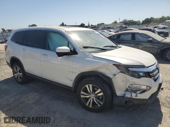 2018 Honda Pilot EX-L with VIN 5FNYF6H54JB013986, listed as a Copart auction lot 60743165 with 124,373 mi miles and Salvage title. Bid and sale history available at DreamBid. Image 4.