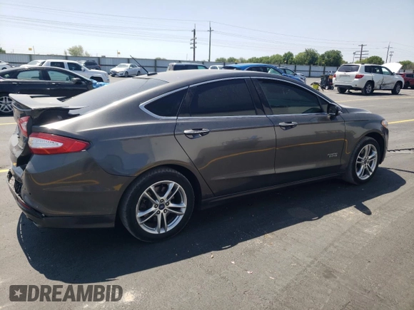 2016 Ford Fusion Titanium with VIN 3FA6P0SU0GR173636, listed as a Copart auction lot 59588095 with 119,998 mi miles and Salvage title. Bid and sale history available at DreamBid. Image 3.