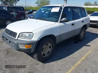 1999 Toyota RAV4 with VIN JT3GP10V2X7064915, listed as a IAAI auction lot 41998544 with 302,351 mi miles and . Bid and sale history available at DreamBid. Image 17.