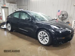 2023 Tesla Model 3 Long Range with VIN 5YJ3E1EB0PF608630, listed as a Copart auction lot 44379105 with 22,777 mi miles and Salvage Title. Bid and sale history available at DreamBid. Image 4.