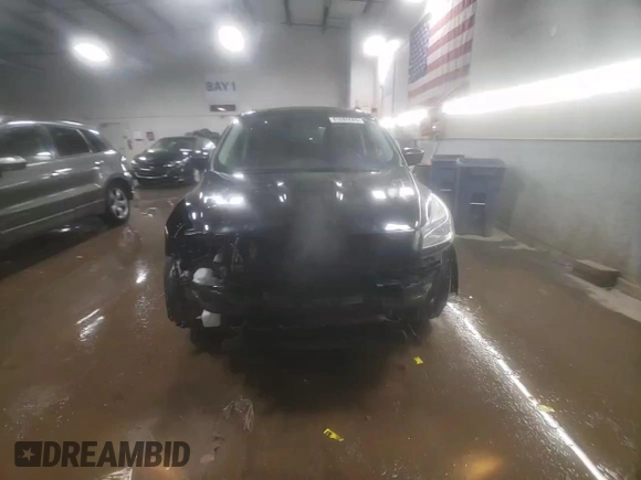2015 Ford Escape SE with VIN 1FMCU0GX4FUC57258, listed as a Copart auction lot 51085685 with 216,724 mi miles and Salvage Title. Bid and sale history available at DreamBid. Image 14.