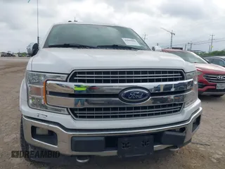 2018 Ford F-150 XL with VIN 1FTEW1EG5JKD32988, listed as a IAAI auction lot 42099086 with 127,541 mi miles. Bid and sale history available at carsss.com. Image 11.