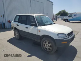 1996 Toyota RAV4 with VIN JT3GP10V3T0005875, listed as a Copart auction lot 57359135 with 240,763 mi miles and Salvage Title. Bid and sale history available at DreamBid. Image 4.
