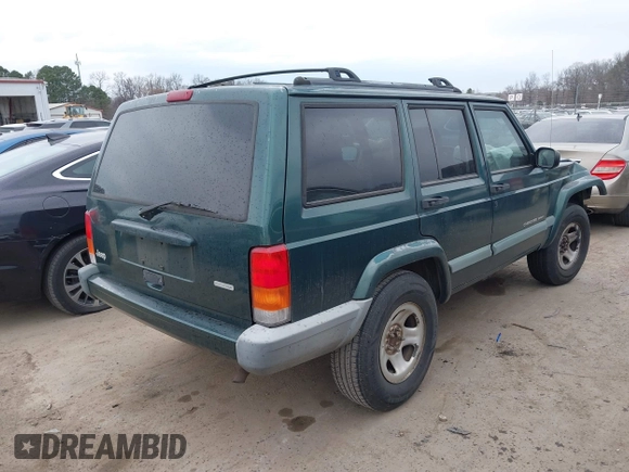 2000 Jeep Cherokee with VIN 1J4FT48S6YL102373, listed as a IAAI auction lot 41685817 with 214,106 mi miles and . Bid and sale history available at DreamBid. Image 4.