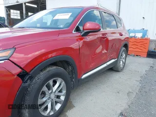 2020 Hyundai Santa Fe SE with VIN 5NMS2CADXLH152362, listed as a IAAI auction lot 42458008 with 148,678 mi miles and . Bid and sale history available at DreamBid. Image 6.