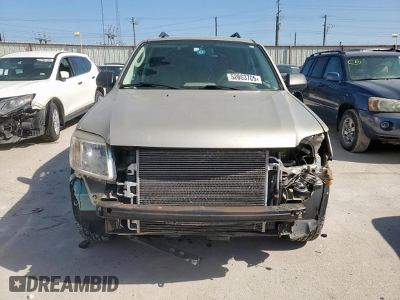 2010 Mercury Mariner with VIN 4M2CN8BG0AKJ09078, listed as a Copart auction lot 52863705 with 98,350 mi miles and Salvage title. Bid and sale history available at DreamBid. Image 5.