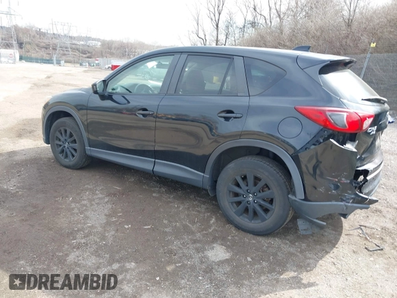 2015 Mazda CX-5 Touring with VIN JM3KE4CY2F0445178, listed as a IAAI auction lot 41828953 with 137,330 mi miles and . Bid and sale history available at DreamBid. Image 3.