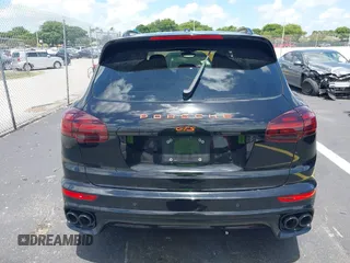 2016 Porsche Cayenne GTS z VIN WP1AD2A25GLA70430, wystawiony jako IAAI lot #42547008 z przebiegiem 108 374 mil mil oraz . Historia ofert i sprzedaży dostępna na DreamBid. Obrazek 16.