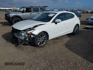 2018 Mazda 3 Touring with VIN 3MZBN1L31JM225108, listed as a IAAI auction lot 41959304 with 74,933 mi miles. Bid and sale history available at carsss.com. Image 18.