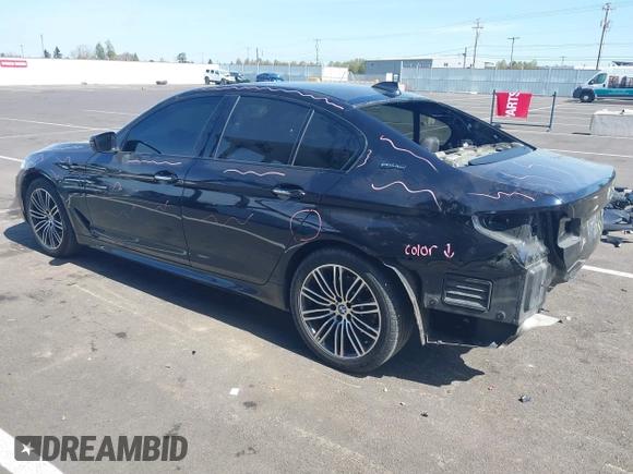 2018 BMW 5 Series 530e xDrive with VIN WBAJB1C51JB374308, listed as a IAAI auction lot 41965038 with 122,791 mi miles and . Bid and sale history available at carsss.com. Image 3.