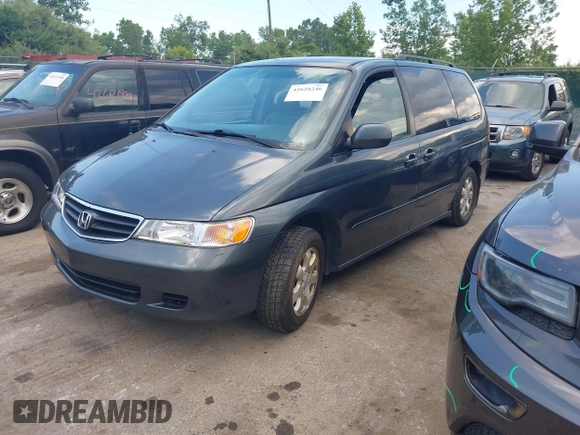 2004 Honda Odyssey EX-L with VIN 5FNRL189X4B045459, listed as a IAAI auction lot 42628246 with 181,328 mi miles and . Bid and sale history available at DreamBid. Image 2.