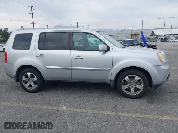 2015 Honda Pilot EX-L with VIN 5FNYF3H68FB001256, listed as a IAAI auction lot 42028966 with 277,927 mi miles and . Bid and sale history available at carsss.com. Image 13.