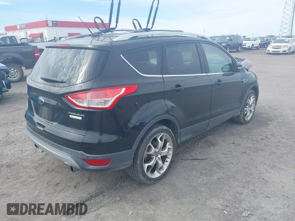 2013 Ford Escape Titanium z VIN 1FMCU0J90DUB32703, wystawiony jako IAAI lot #41714424 z przebiegiem 127 639 mil mil oraz . Historia ofert i sprzedaży dostępna na DreamBid. Obrazek 4.