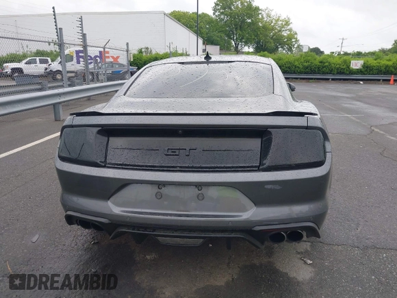 2021 Ford Mustang GT z VIN 1FA6P8CF0M5105060, wystawiony jako IAAI lot #41967671 z przebiegiem 27 626 mil mil oraz . Historia ofert i sprzedaży dostępna na DreamBid. Obrazek 16.