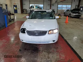 1999 Chevrolet Malibu LS with VIN 1G1NE52M5XY116867, listed as a Copart auction lot 51363475 with 121,874 mi miles and Salvage Title. Bid and sale history available at DreamBid. Image 5.