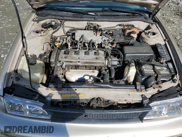 1995 Toyota Corolla DX with VIN 2T1AE09B0SC098739, listed as a Copart auction lot 57653205 with 154,226 mi miles and Salvage title. Bid and sale history available at DreamBid. Image 11.