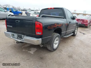 2003 Dodge Ram 1500 ST with VIN 1D7HA16K13J506634, listed as a IAAI auction lot 41529060 with 165,898 mi miles. Bid and sale history available at carsss.com. Image 4.
