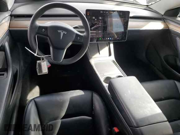 2023 Tesla Model 3 with VIN 5YJ3E1EA0PF449499, listed as a Copart auction lot 52900515 with 42,706 mi miles and Non Repairable. Bid and sale history available at DreamBid. Image 8.