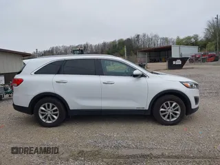 2016 Kia Sorento LX with VIN 5XYPGDA59GG150351, listed as a IAAI auction lot 42006707 with 152,617 mi miles and . Bid and sale history available at carsss.com. Image 13.