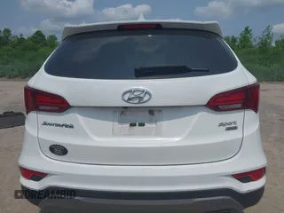 2017 Hyundai Santa Fe 2.4L with VIN 5XYZTDLB0HG383382, listed as a IAAI auction lot 42433450 with 136,610 mi miles and . Bid and sale history available at DreamBid. Image 17.